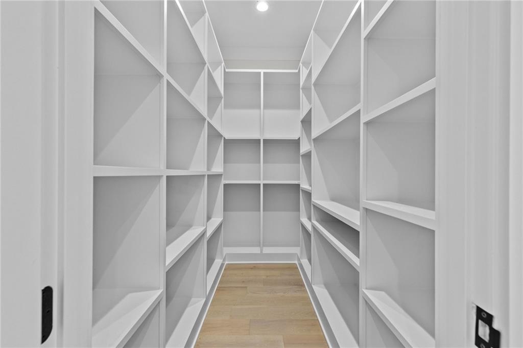 4521 Jack Pittman Road Monroe, GA 30656 - Photo 26 of 78 a view of closet area with empty racks