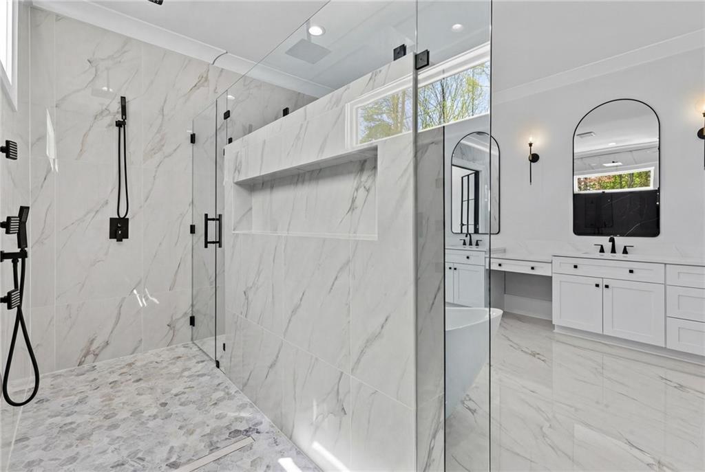4521 Jack Pittman Road Monroe, GA 30656 - Photo 33 of 78 a bathroom with a sink a toilet and shower
