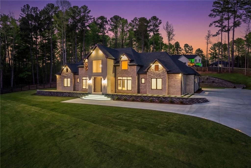 4521 Jack Pittman Road Monroe, GA 30656 - Photo 4 of 78 a front view of a house with a yard