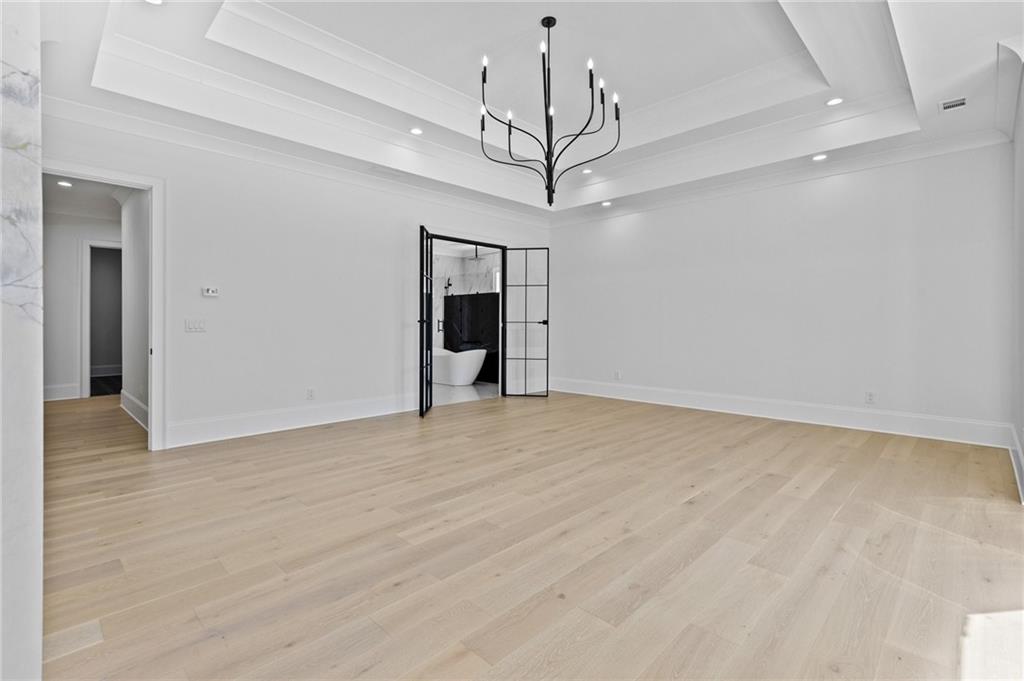 4521 Jack Pittman Road Monroe, GA 30656 - Photo 52 of 78 a view of empty room with wooden floor