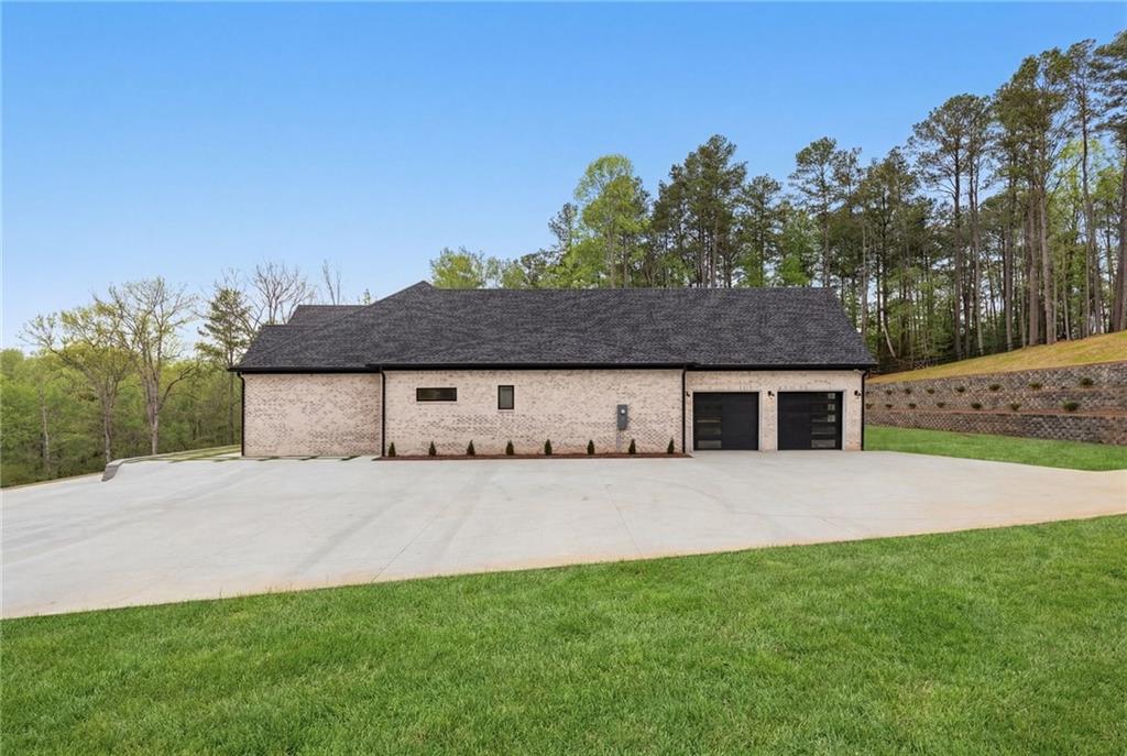 4521 Jack Pittman Road Monroe, GA 30656 - Photo 64 of 78 front view of house with a yard