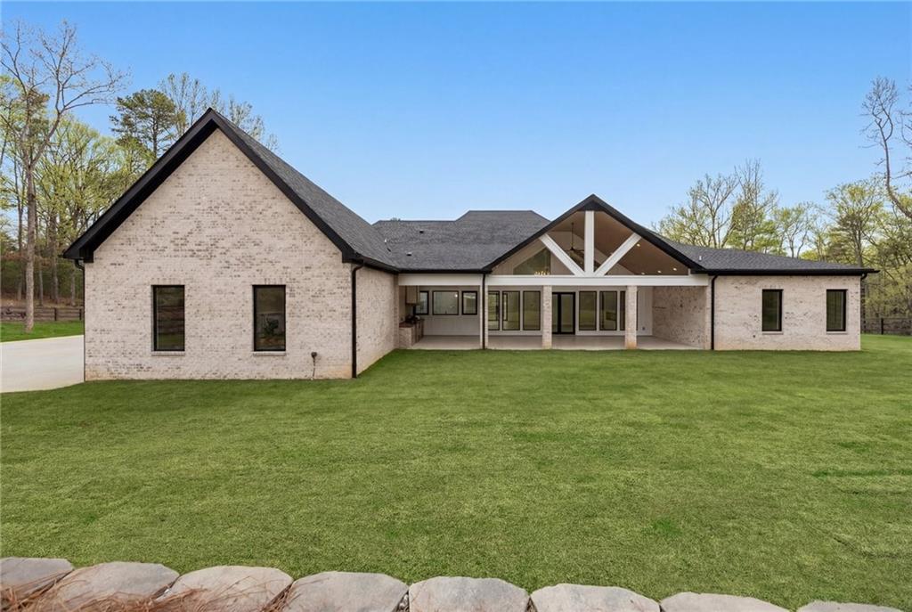 4521 Jack Pittman Road Monroe, GA 30656 - Photo 65 of 78 a view of a house with a yard