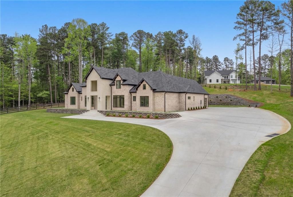 4521 Jack Pittman Road Monroe, GA 30656 - Photo 74 of 78 a front view of a house with garden