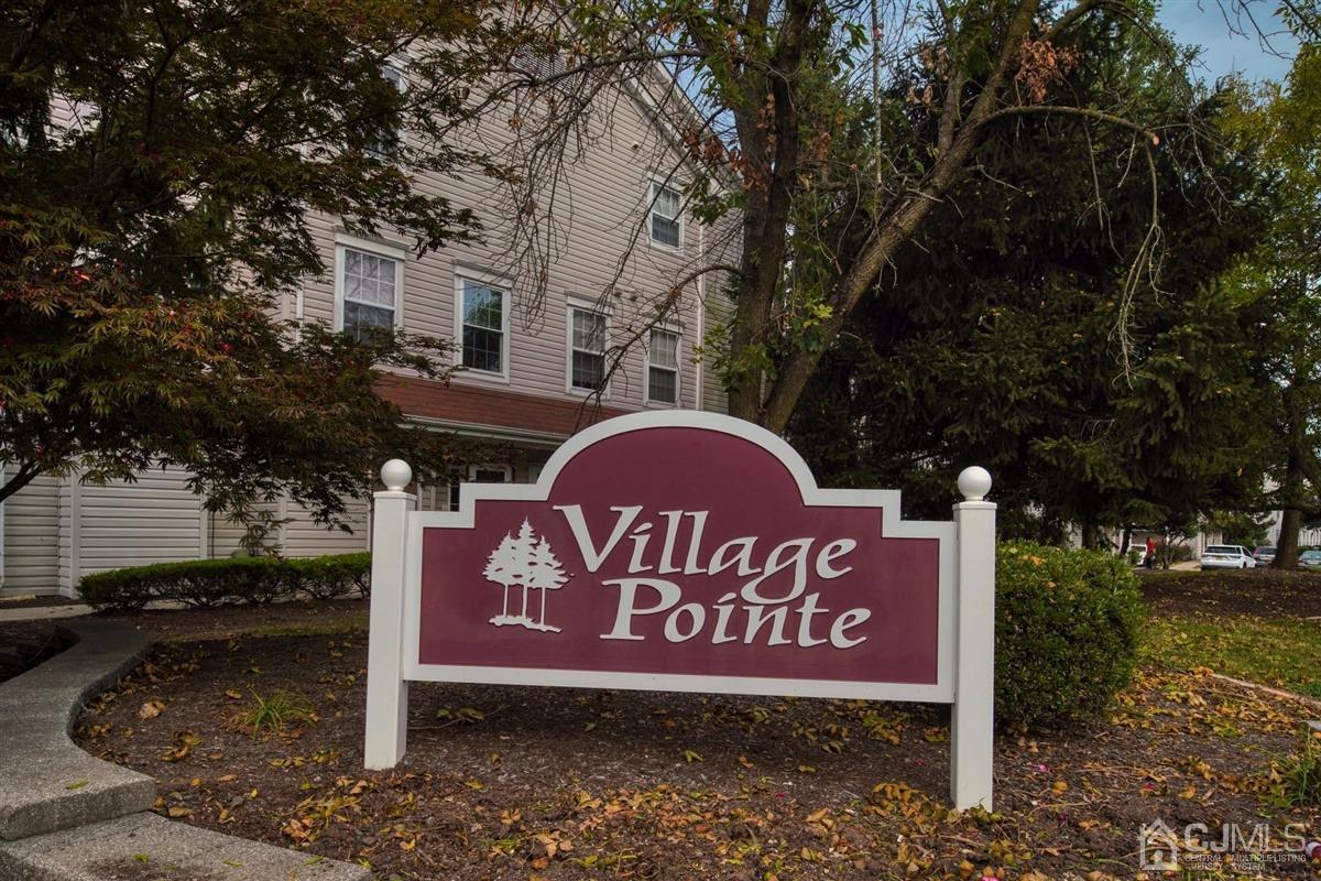 1 Prestwick Way, Unit 1 Edison, NJ 08820 - Photo 2 of 24 a sign that is on the side of the road