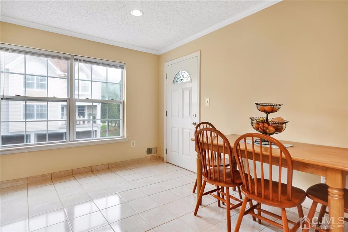 1 Prestwick Way, Unit 1 Edison, NJ 08820 - Photo 11 of 24 a view of a chairs in a room