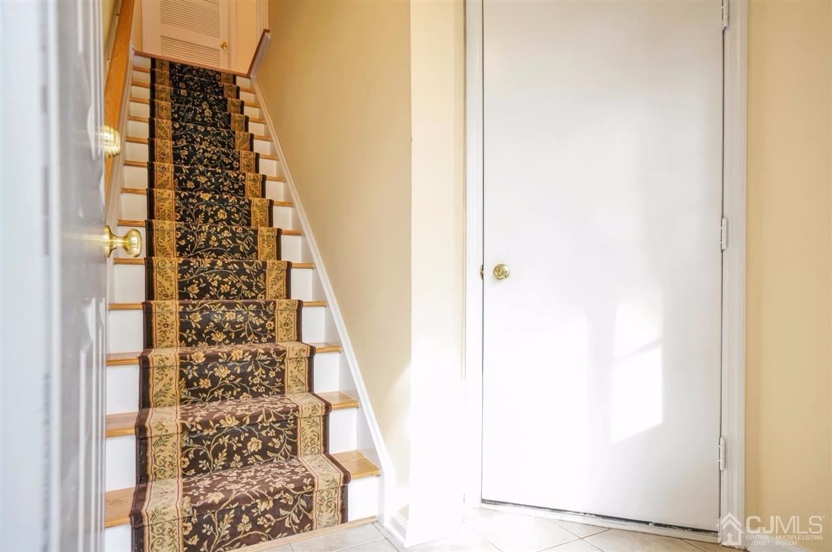 1 Prestwick Way, Unit 1 Edison, NJ 08820 - Photo 3 of 24 view of a bathroom with a shower curtain