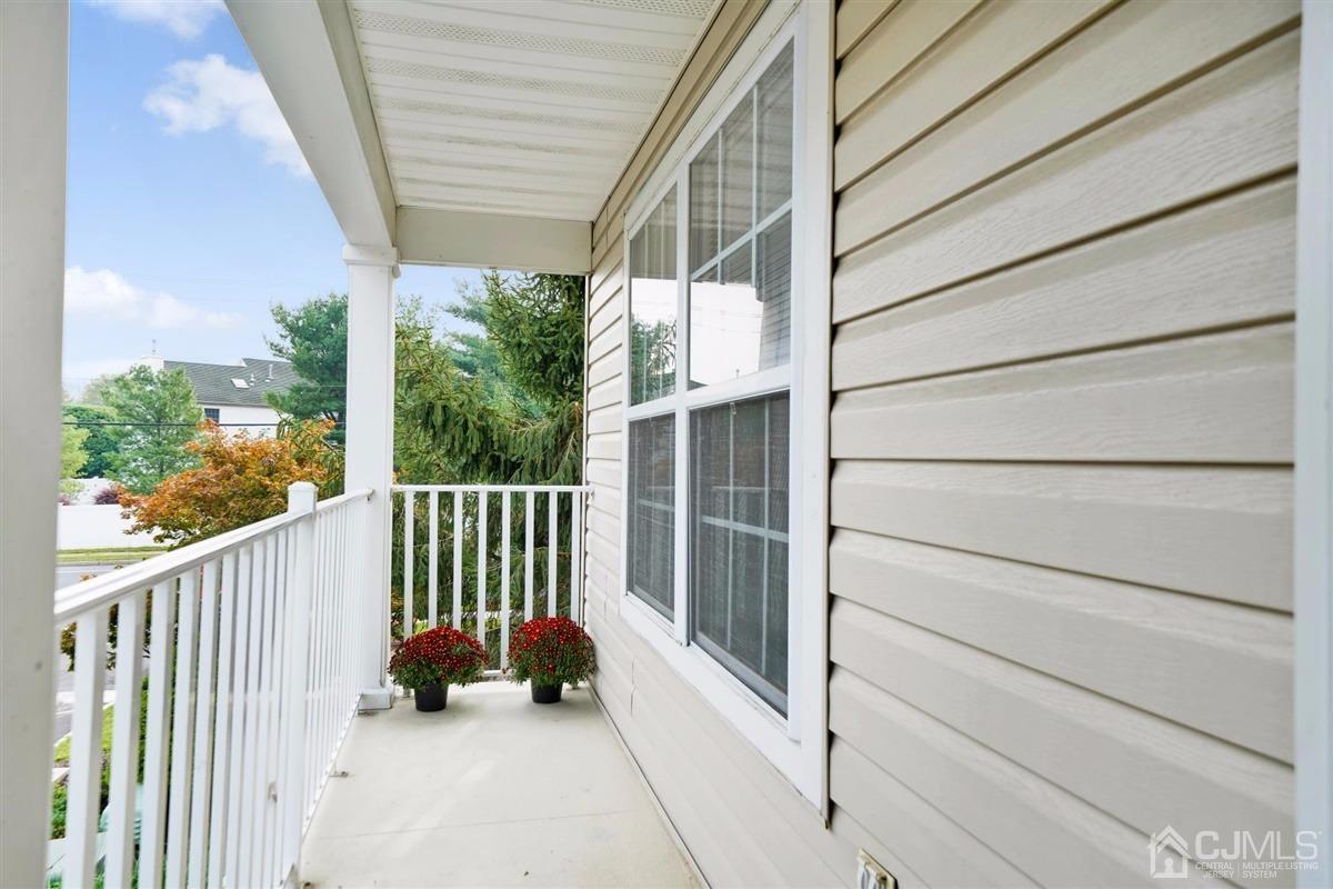 1 Prestwick Way, Unit 1 Edison, NJ 08820 - Photo 21 of 24 a view of balcony with furniture