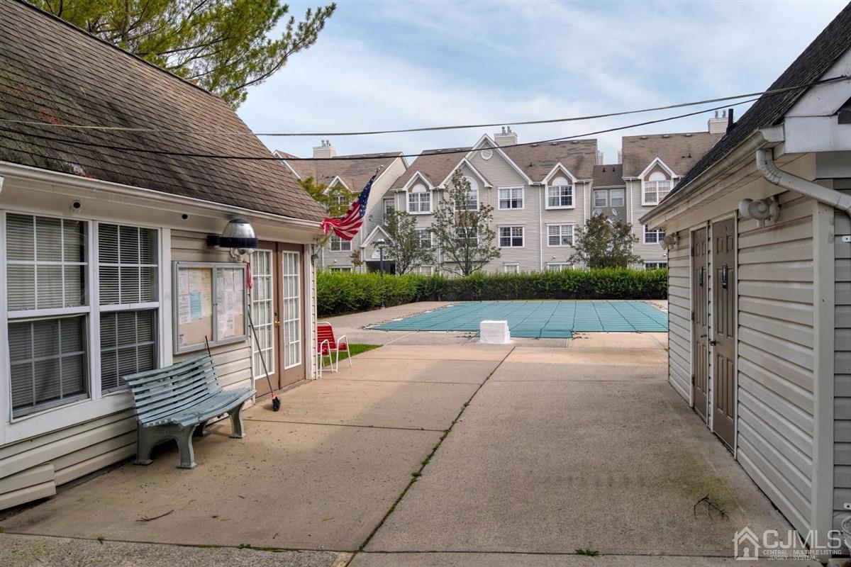 1 Prestwick Way, Unit 1 Edison, NJ 08820 - Photo 24 of 24 a view of a porch with furniture and a yard
