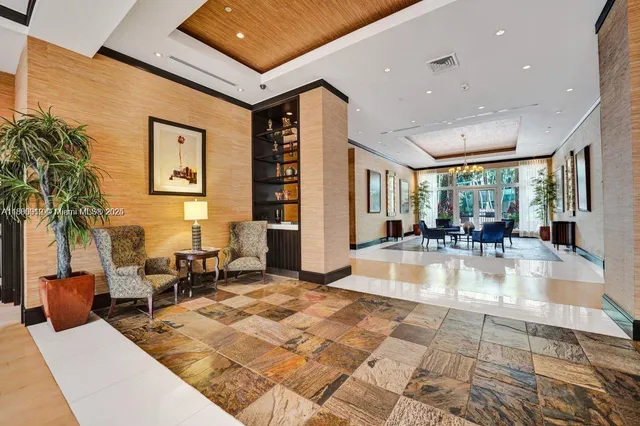 a view of livingroom with dining room and furniture