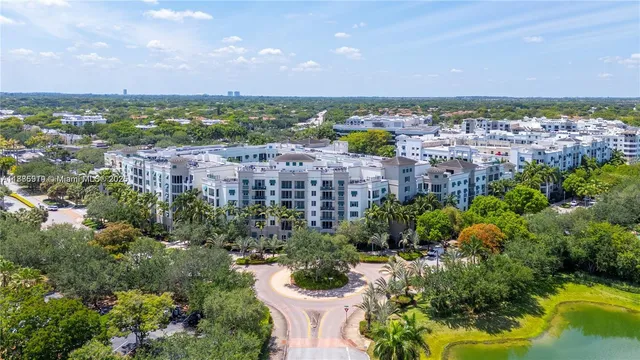 a view of a swimming pool with a yard
