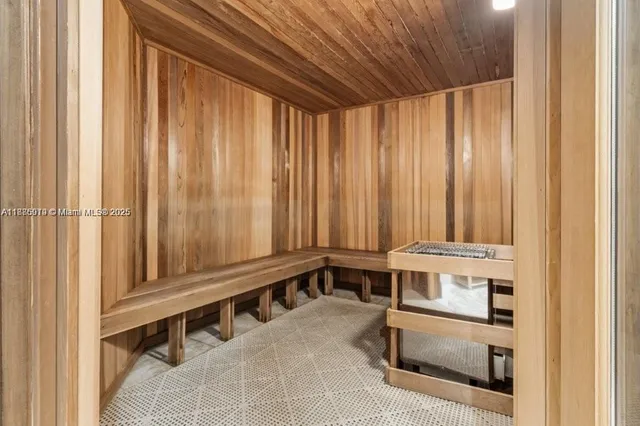 a view of a chair and table in a room