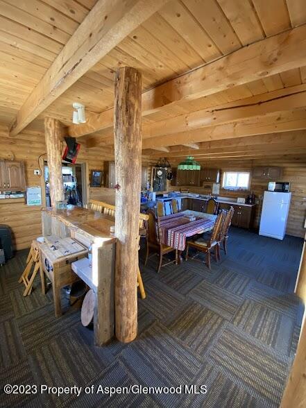80 Sapling Lane Craig, CO 81625 - Photo 14 of 27 a outdoor space with lots of tables a couches and kitchen view