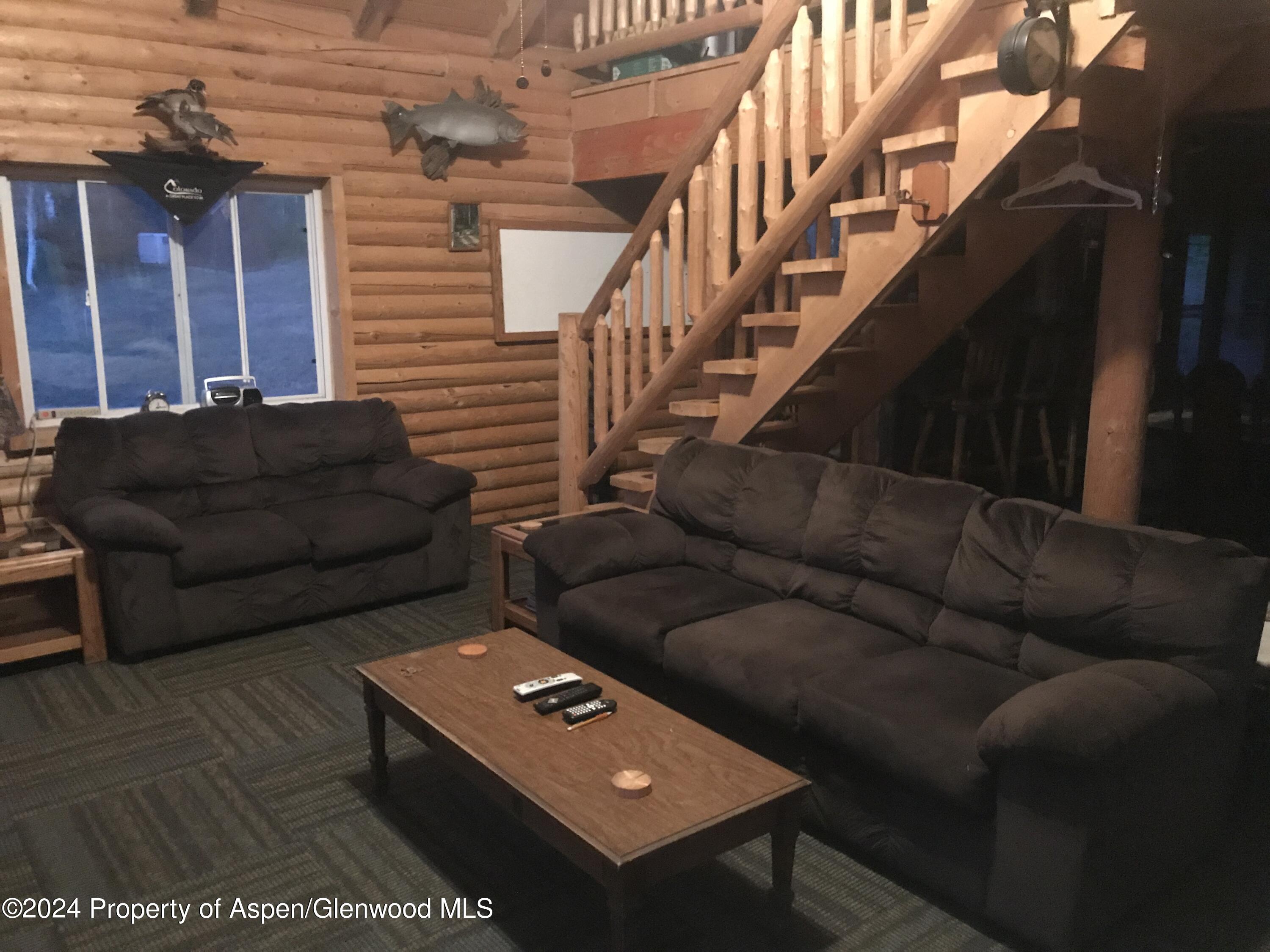 80 Sapling Lane Craig, CO 81625 - Photo 20 of 27 a living room with furniture and a rug