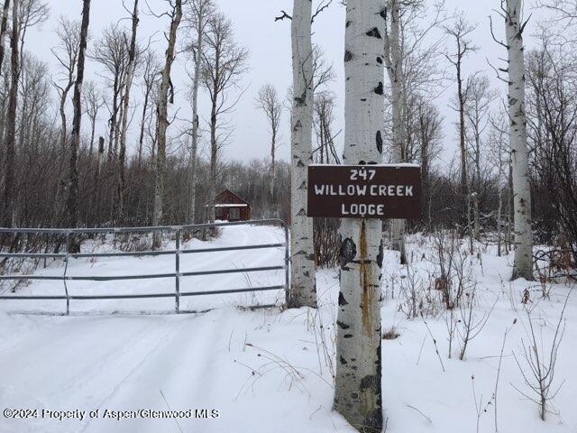 80 Sapling Lane Craig, CO 81625 - Photo 5 of 27 a street sign on a wall next to a road