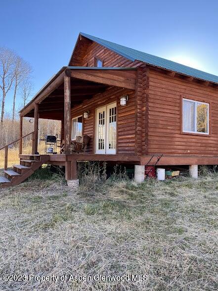 80 Sapling Lane Craig, CO 81625 - Photo 8 of 27 front view of a house with a yard
