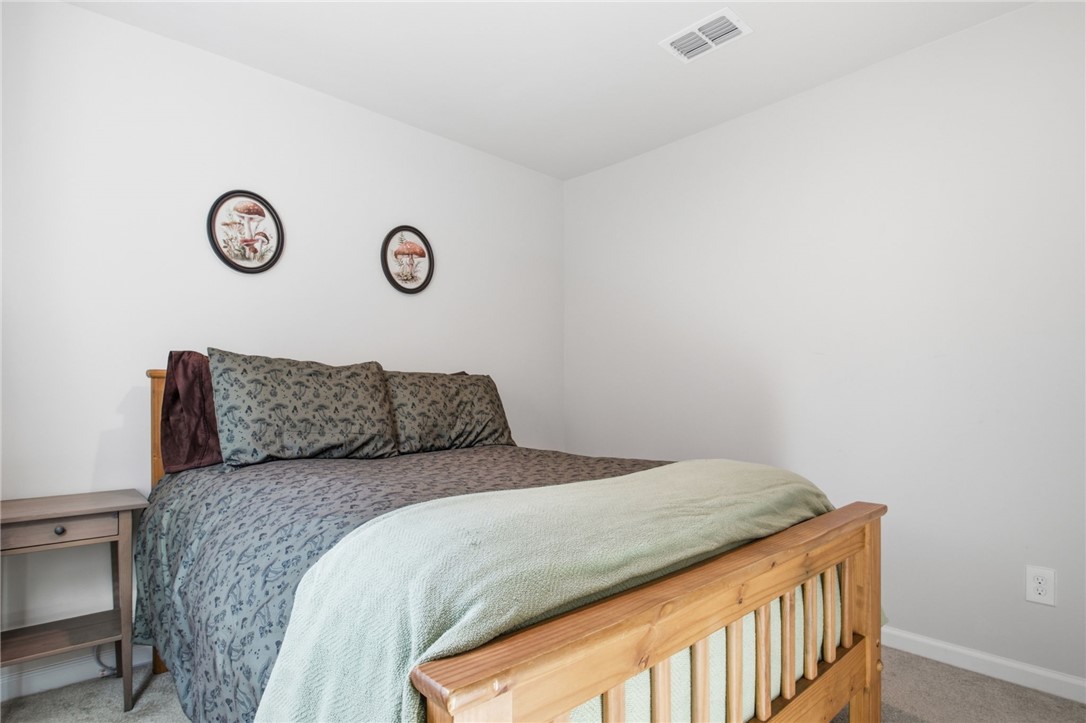 112 Wls Sta Road Seneca, SC 29678 - Photo 24 of 42 Smooth walls and soft carpeting define this quiet sleeping space.