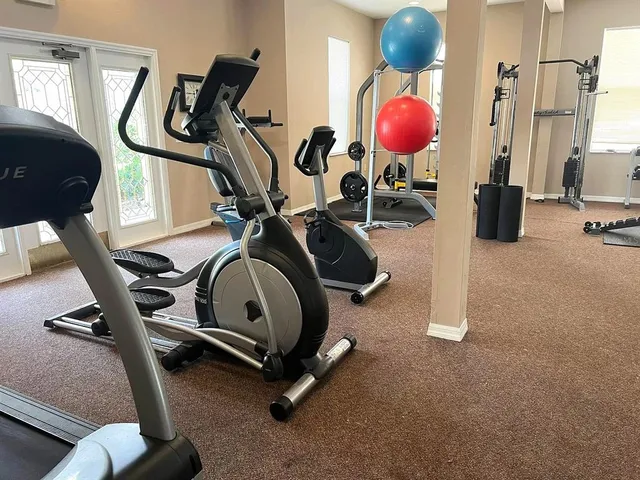 a view of a room with gym equipment