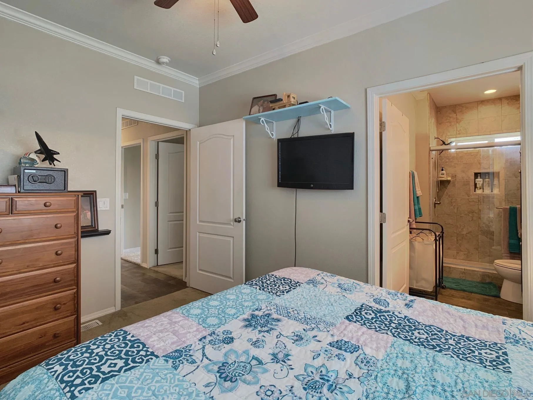 1315 Pepper Drive, Unit 2 El Cajon, CA 92021 - Photo 15 of 29 a bedroom with a bed and a flat screen tv