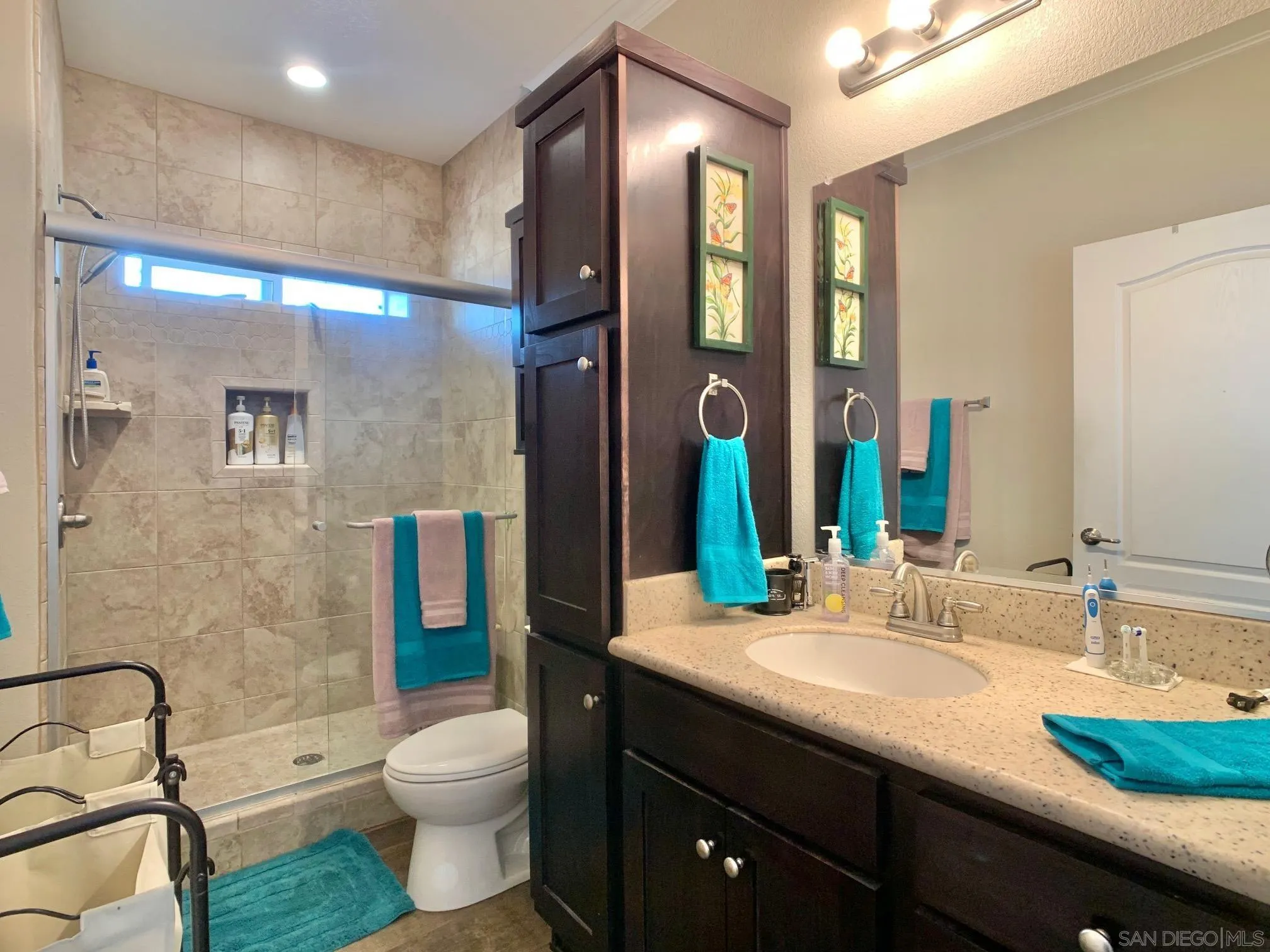 1315 Pepper Drive, Unit 2 El Cajon, CA 92021 - Photo 16 of 29 a bathroom with a granite countertop sink toilet and shower