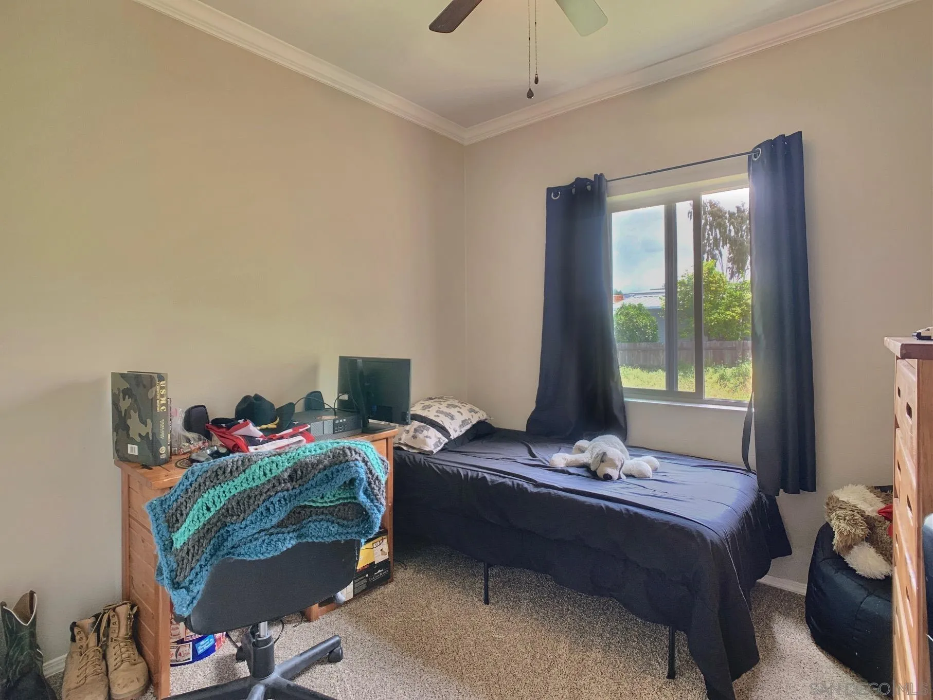 1315 Pepper Drive, Unit 2 El Cajon, CA 92021 - Photo 19 of 29 a bedroom with a bed and a window