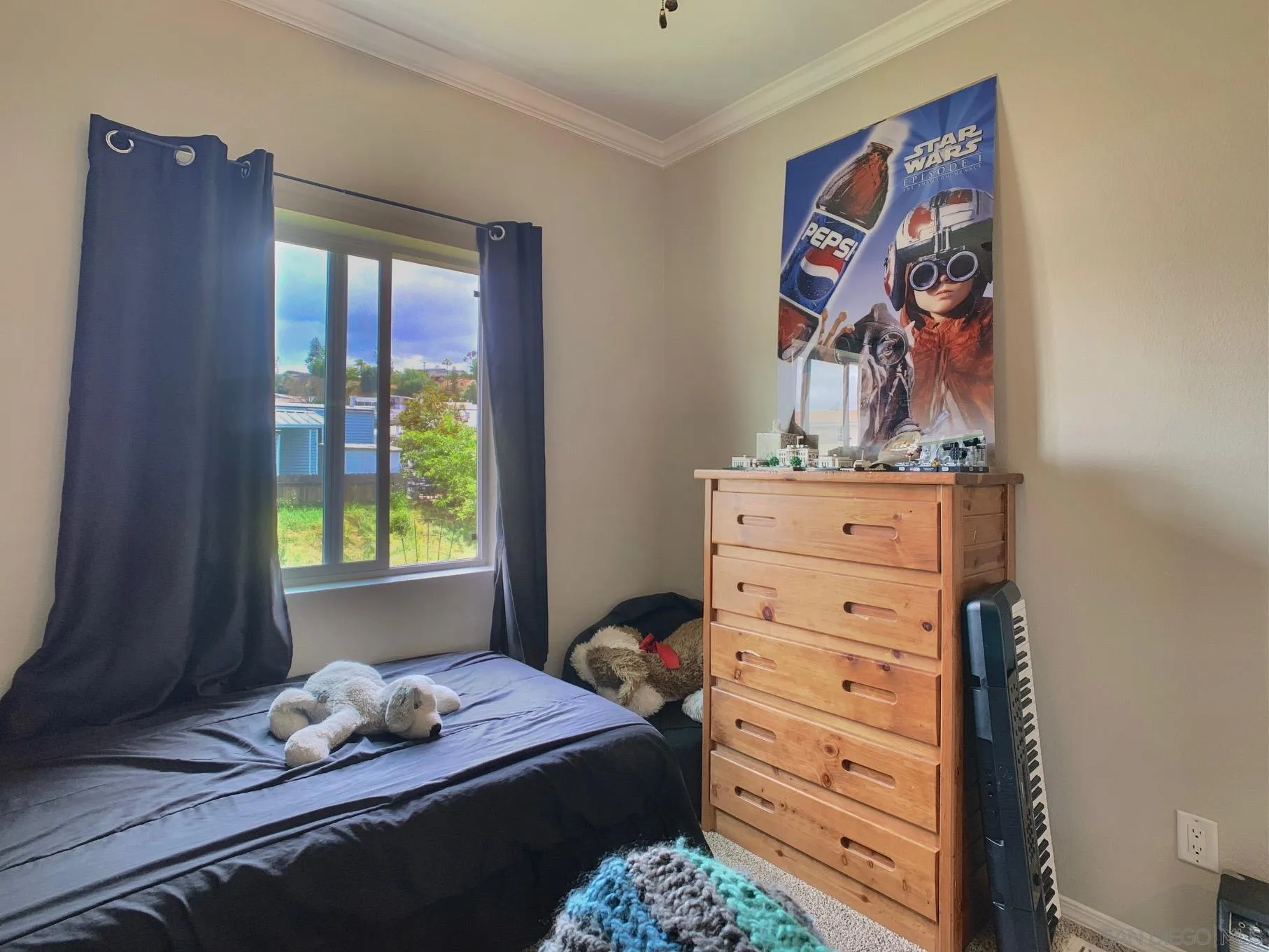 1315 Pepper Drive, Unit 2 El Cajon, CA 92021 - Photo 20 of 29 a bedroom with a bed and a window