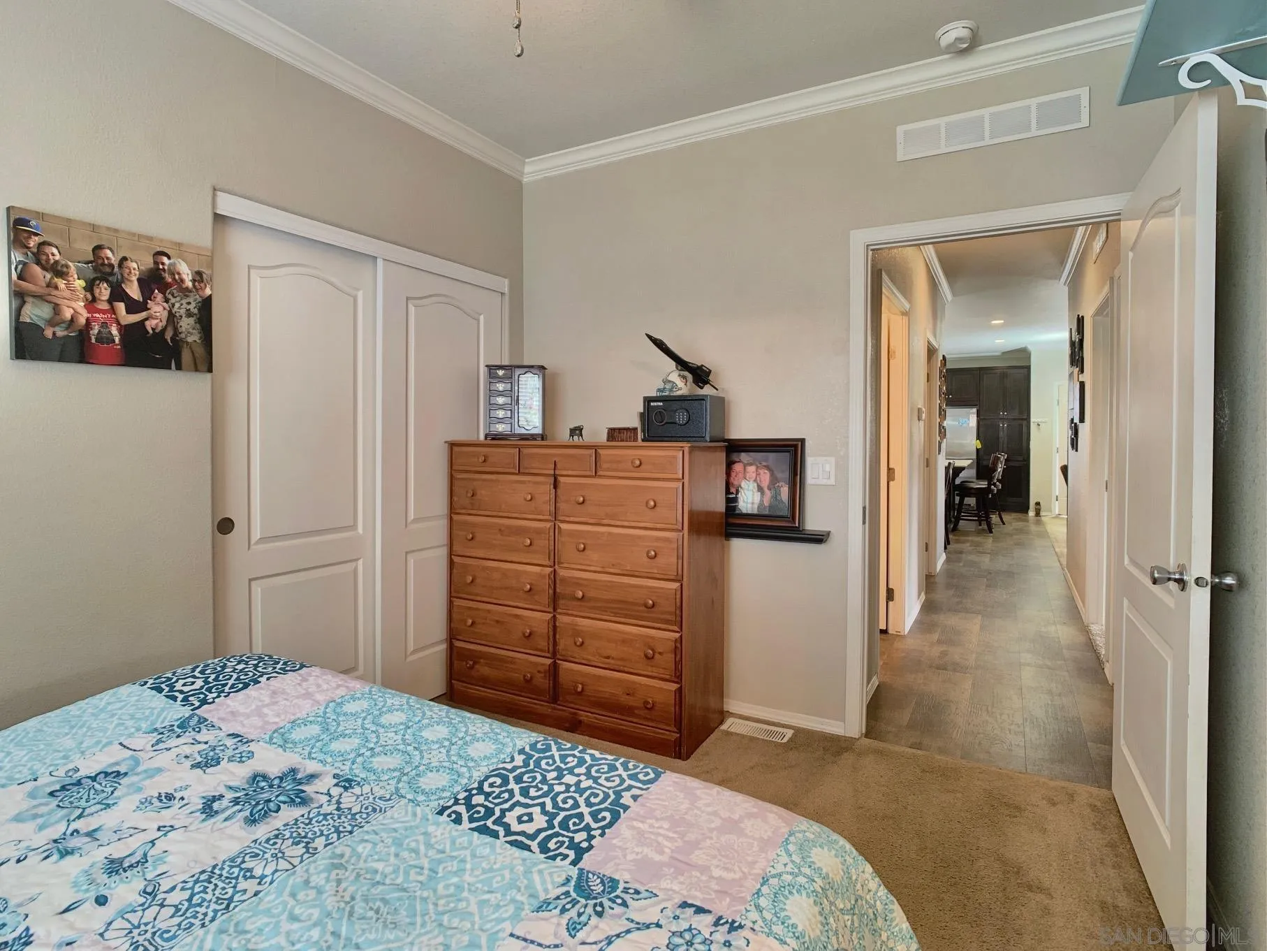 1315 Pepper Drive, Unit 2 El Cajon, CA 92021 - Photo 21 of 29 a bedroom with a bed and a dresser