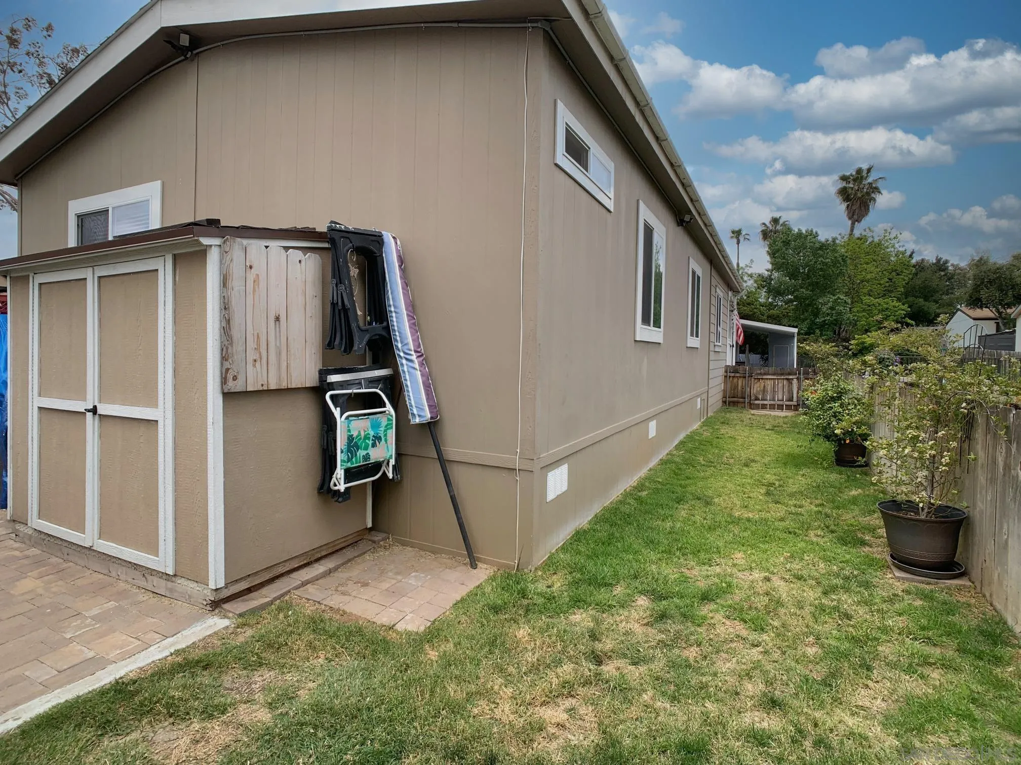 1315 Pepper Drive, Unit 2 El Cajon, CA 92021 - Photo 24 of 29 a backyard of a house with lots of green space