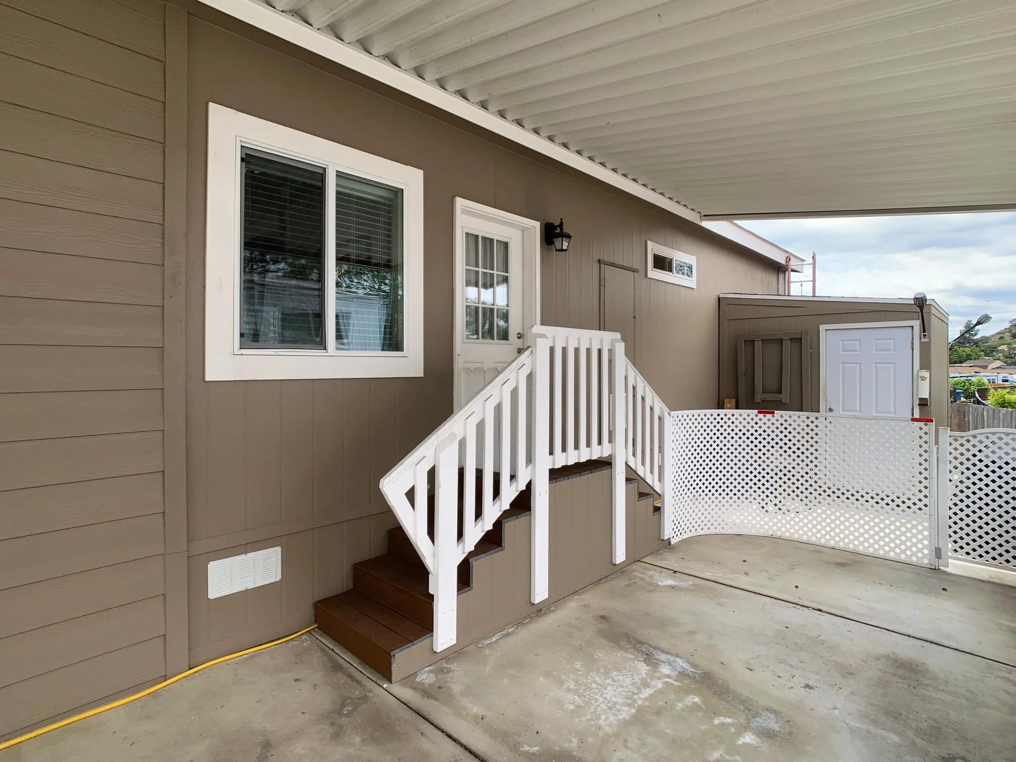 1315 Pepper Drive, Unit 2 El Cajon, CA 92021 - Photo 27 of 29 a view of a deck with couches and wooden floor