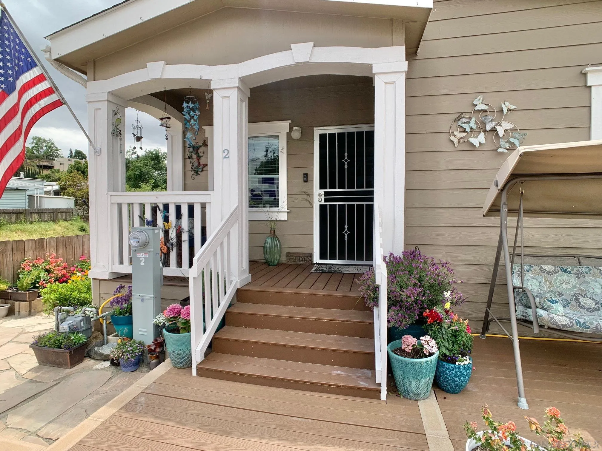 1315 Pepper Drive, Unit 2 El Cajon, CA 92021 - Photo 5 of 29 a view of a porch with flowers
