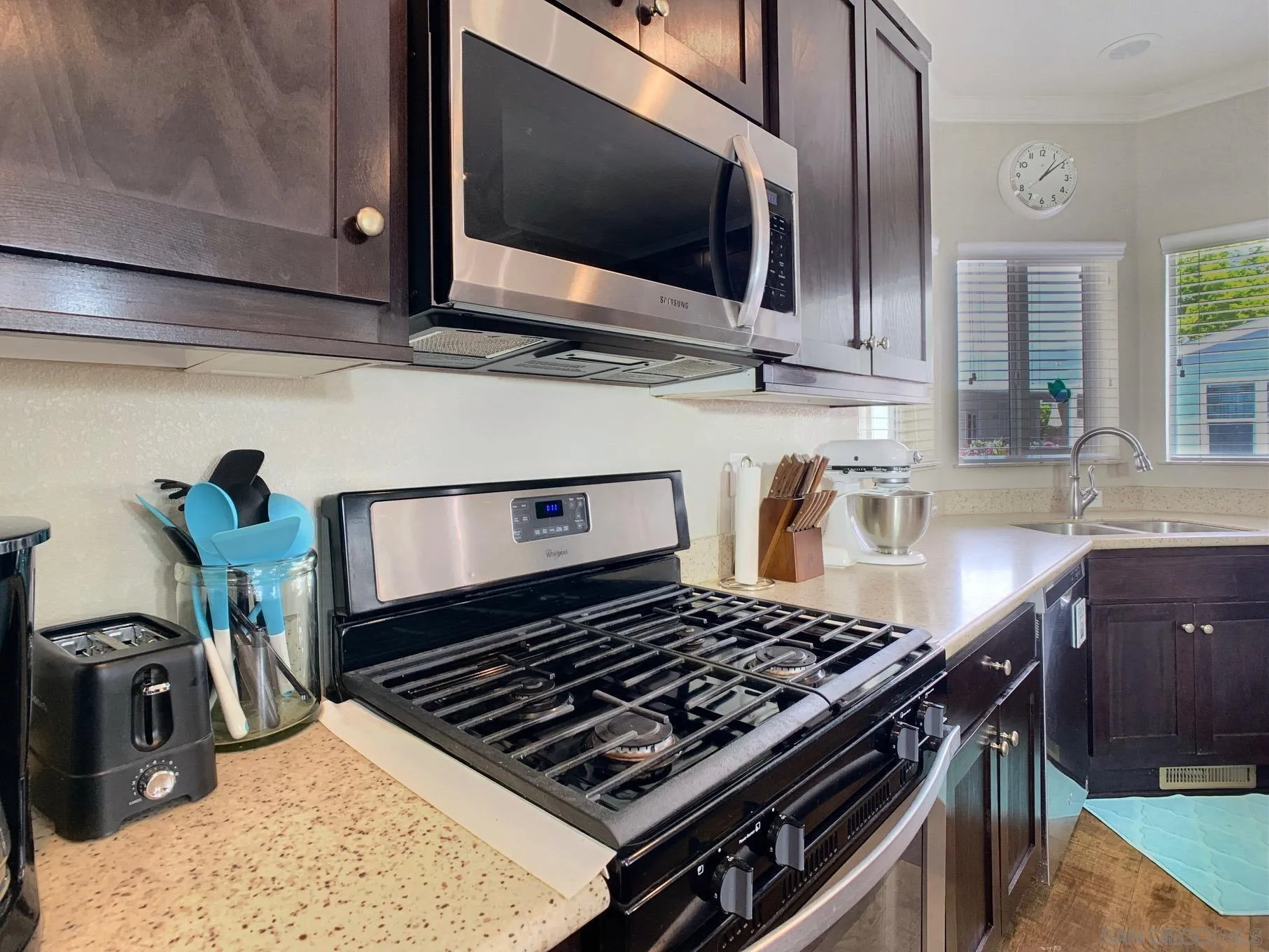 1315 Pepper Drive, Unit 2 El Cajon, CA 92021 - Photo 7 of 29 a kitchen with a stove and a microwave