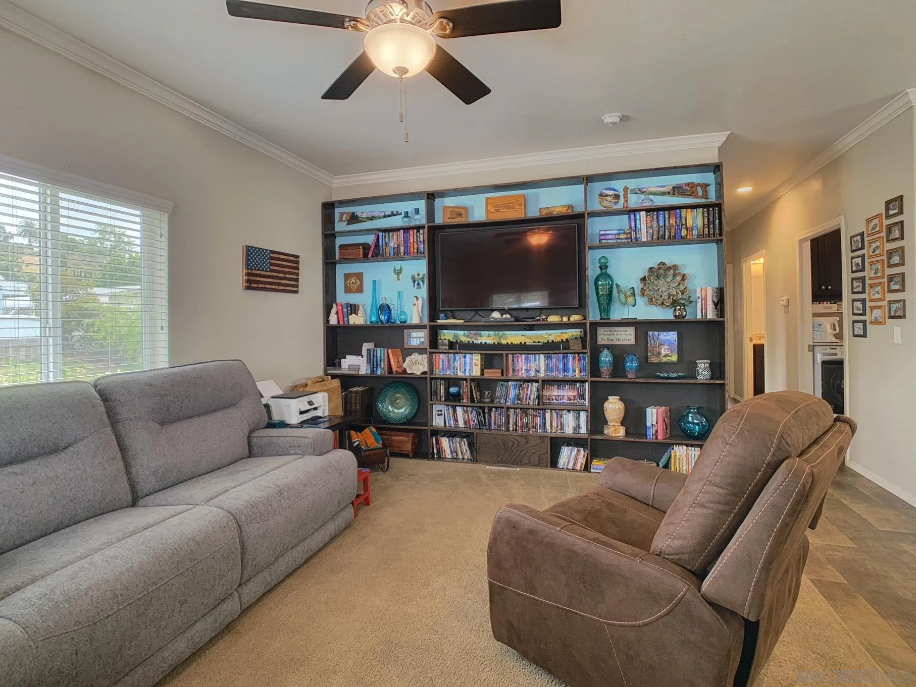 1315 Pepper Drive, Unit 2 El Cajon, CA 92021 - Photo 9 of 29 a living room with furniture and a flat screen tv