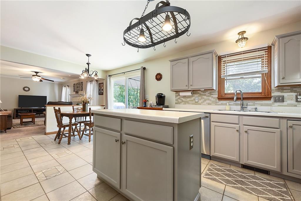 1069 Redoak Drive Harrison City, PA 15636 - Photo 12 of 43 a kitchen with a sink cabinets and window