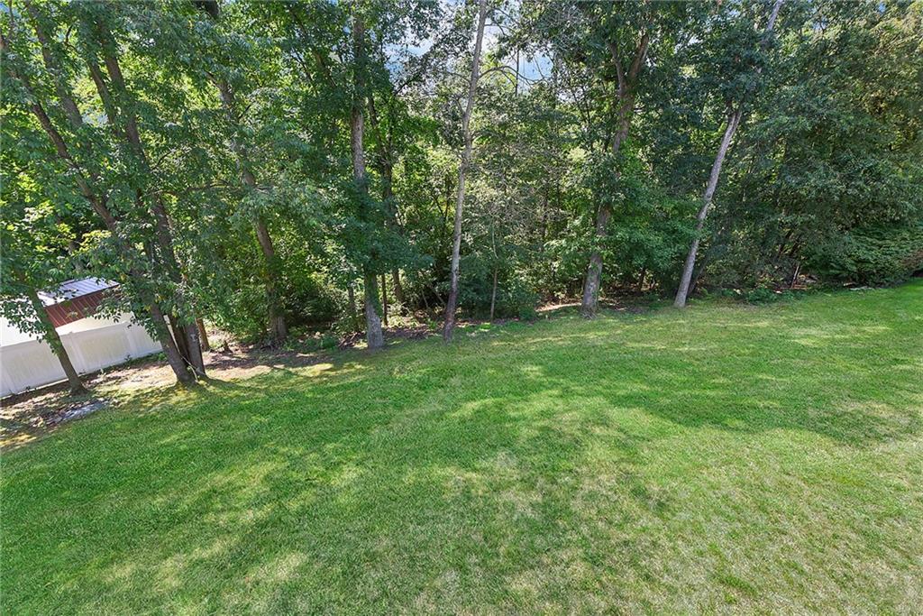 1069 Redoak Drive Harrison City, PA 15636 - Photo 38 of 43 a view of a green field with trees