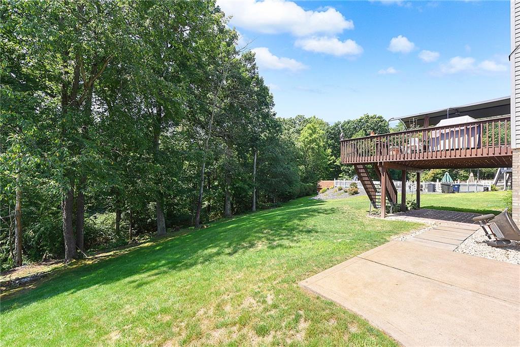 1069 Redoak Drive Harrison City, PA 15636 - Photo 42 of 43 a view of a house with a yard
