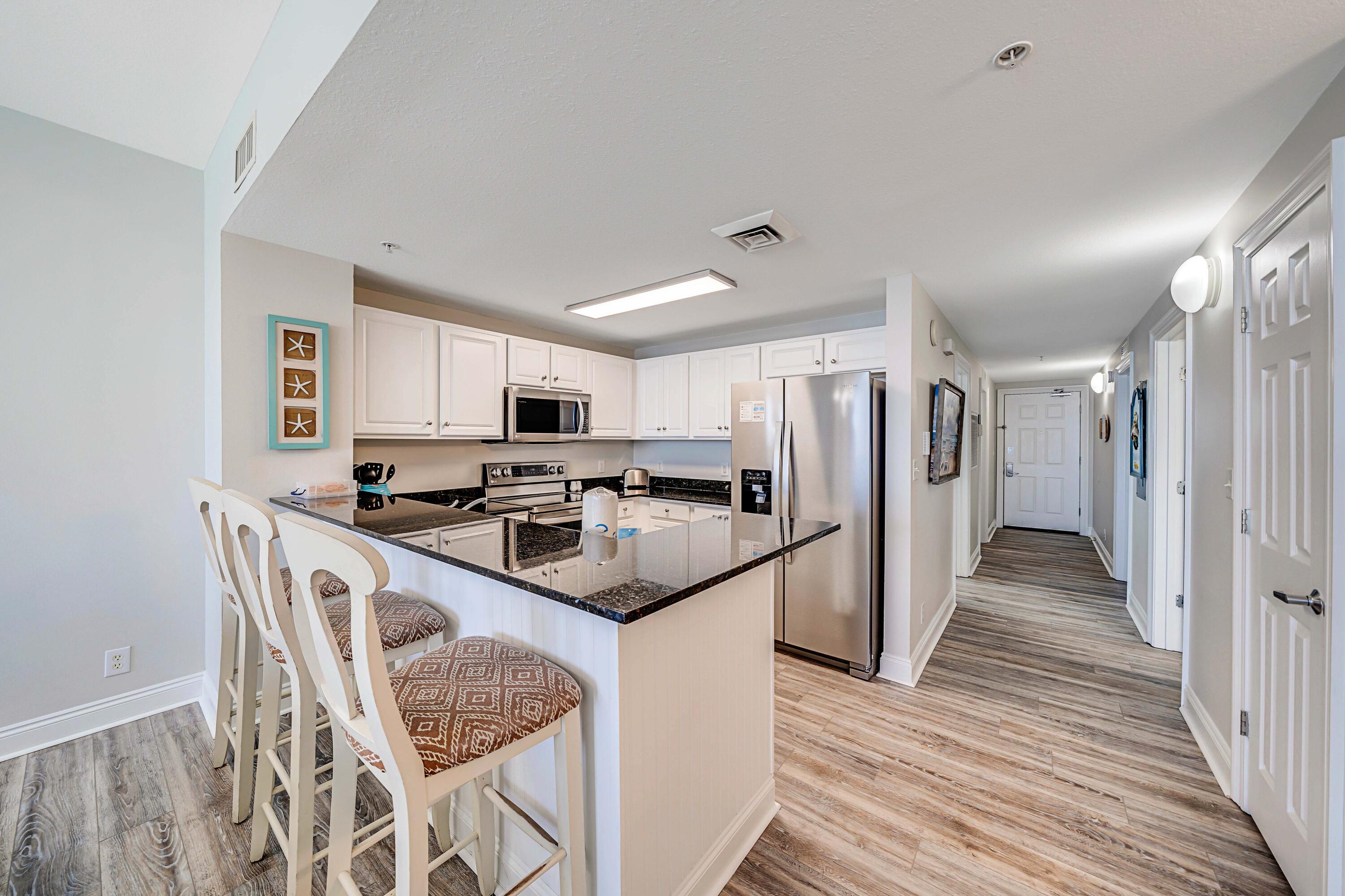 15817 Front Beach Road, Unit 1 1802 Panama City Beach, FL 32413 - Photo 7 of 68 Kitchen with Breakfast Bar
