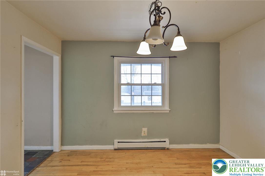 210 South 16th Street Emmaus, PA 18049 - Photo 12 of 71 a view of a room with wooden floor and window