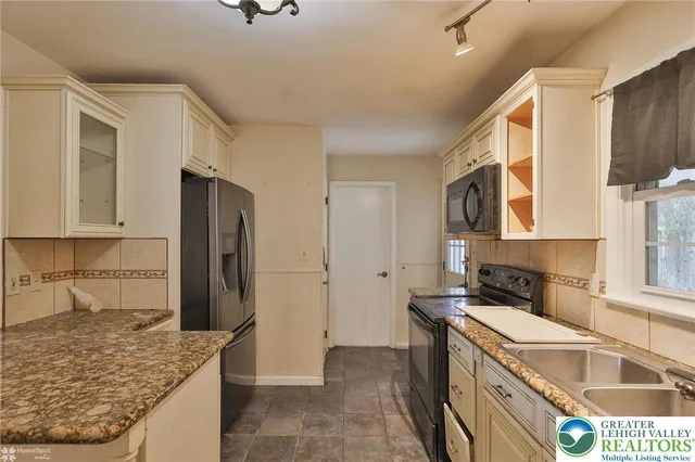 a bathroom with a shower and a tub