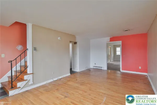 an empty room with windows