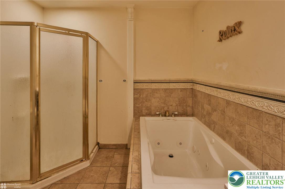 210 South 16th Street Emmaus, PA 18049 - Photo 36 of 71 a bathroom with a shower and a tub