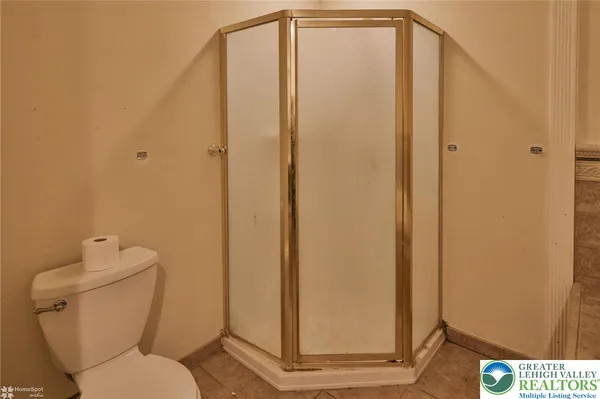 a view of hallway with wooden floor