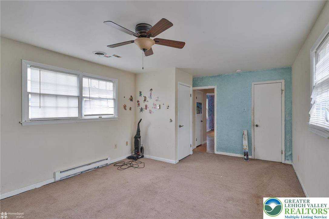 210 South 16th Street Emmaus, PA 18049 - Photo 42 of 71 a view of a livingroom with a ceiling fan and window