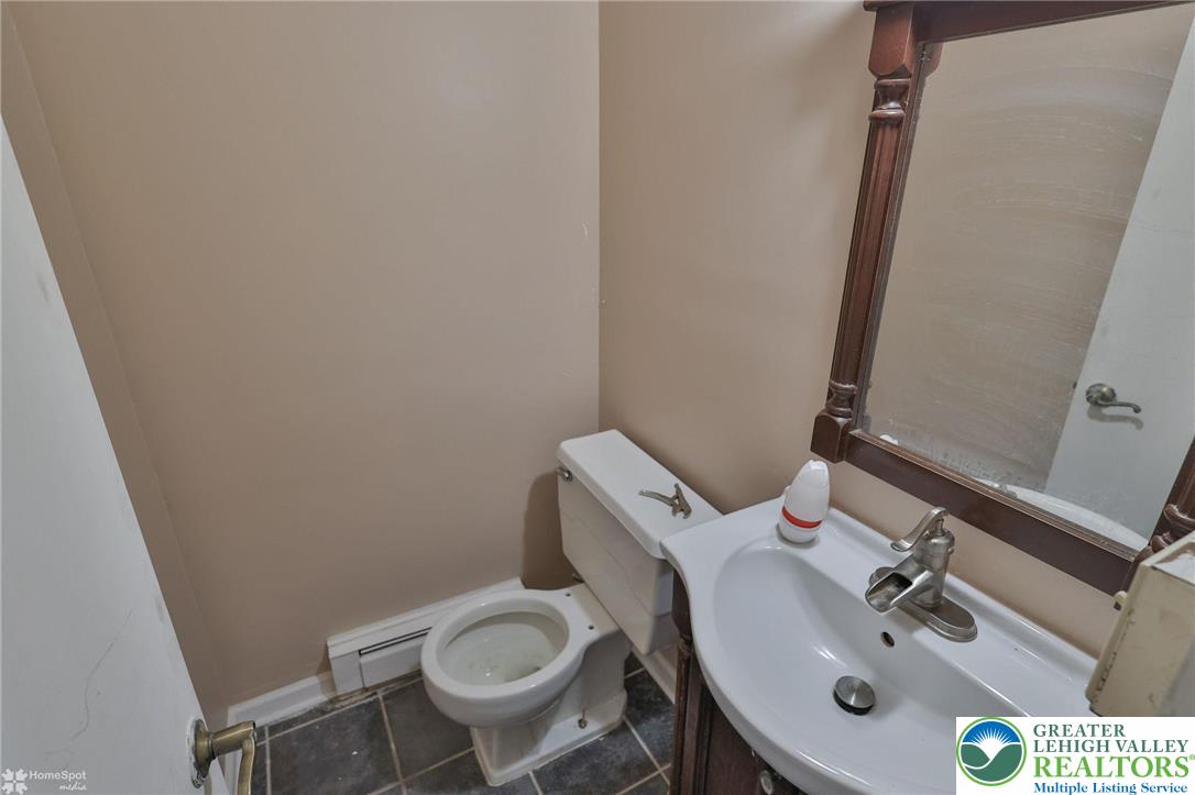 210 South 16th Street Emmaus, PA 18049 - Photo 55 of 71 a bathroom with a sink and a toilet