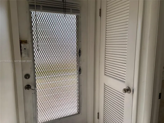 a kitchen with a stove and a microwave