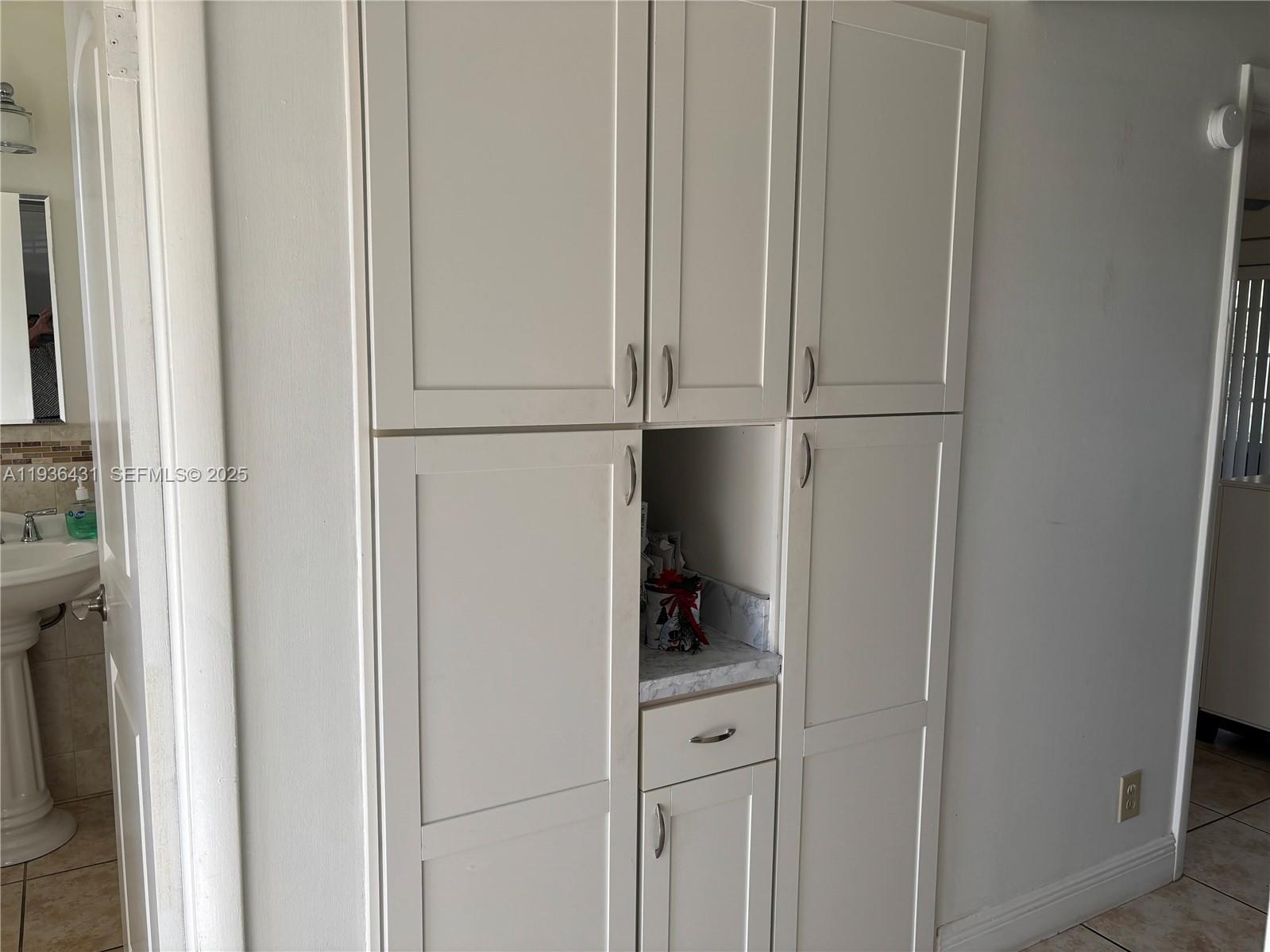 351 Cambridge Road, Unit 108 Hollywood, FL 33024 - Photo 10 of 37 Pantry/Storage closet