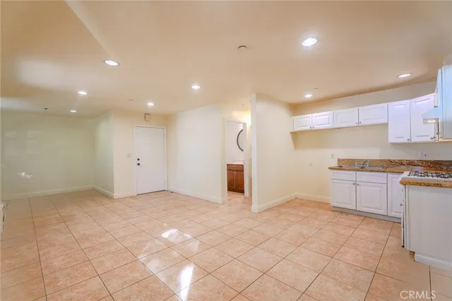 a view of a kitchen with a sink