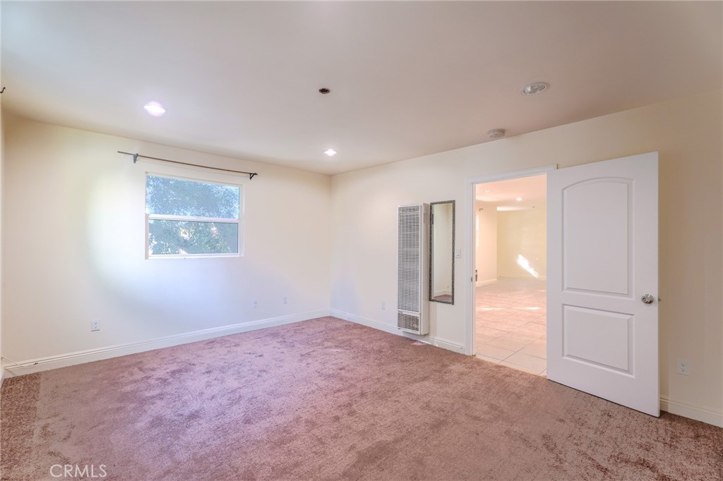 6364 Sylmar Avenue Van Nuys, CA 91401 - Photo 8 of 11 en empty room with windows and closet