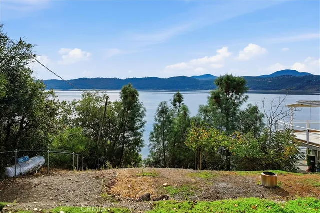 a view of a couches under an umbrella