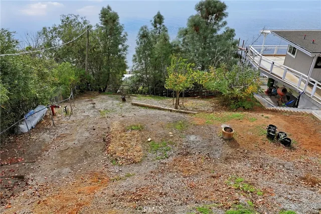 a view of a backyard of a house