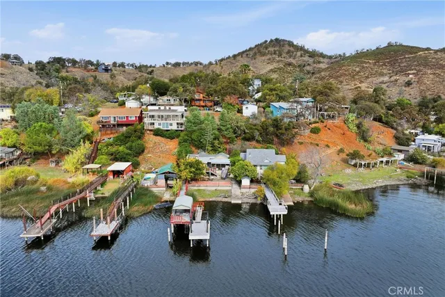 an aerial view of a chairs and table on the terrace