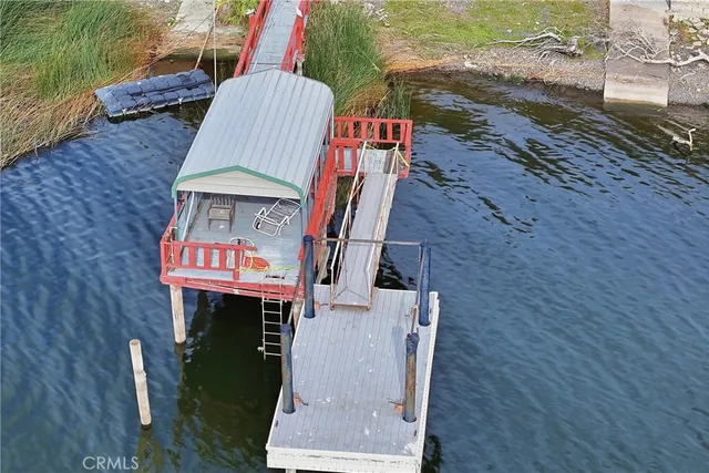 a front view of a house with parking space
